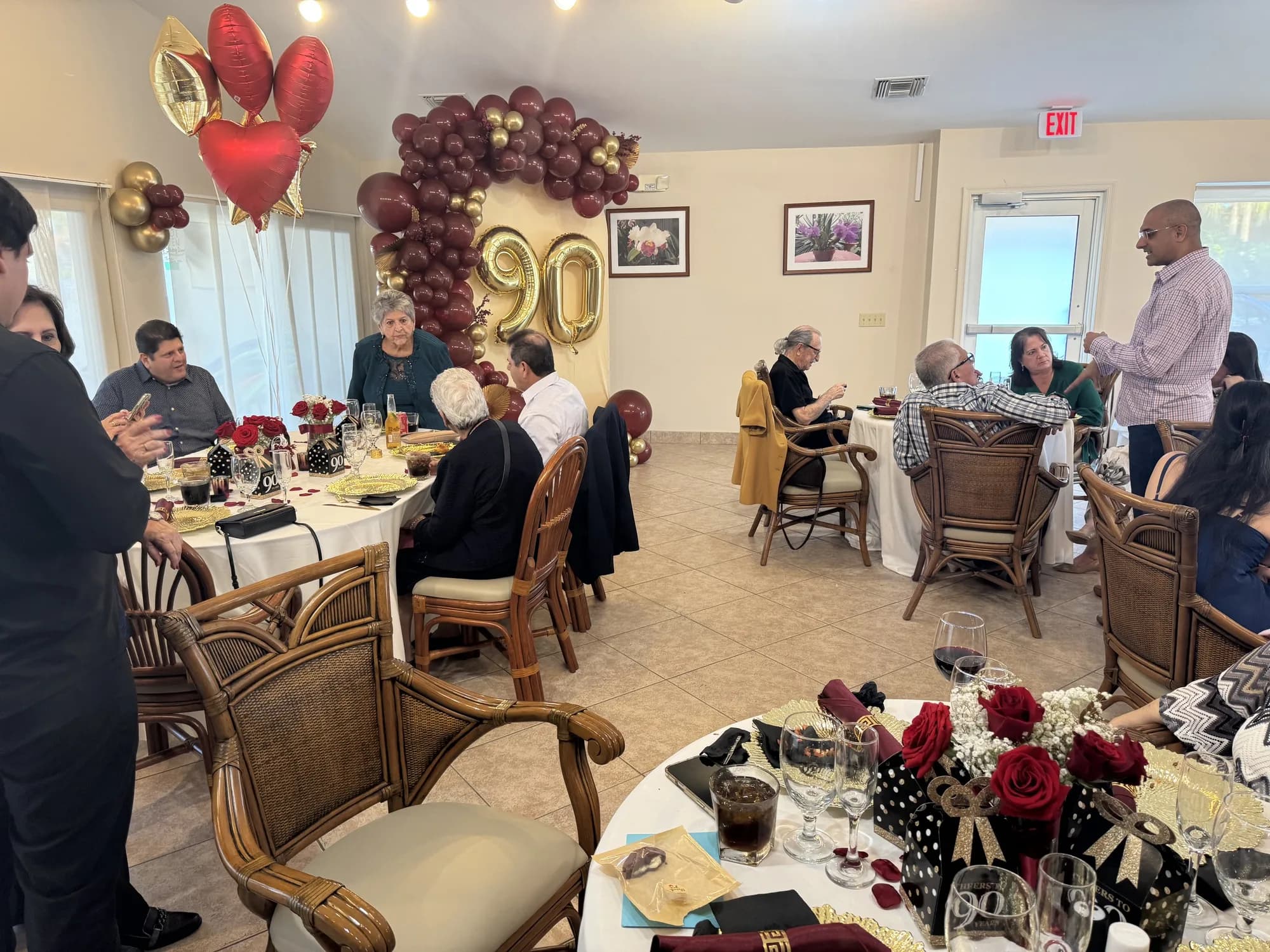 Tables set for a 90th birthday celebration