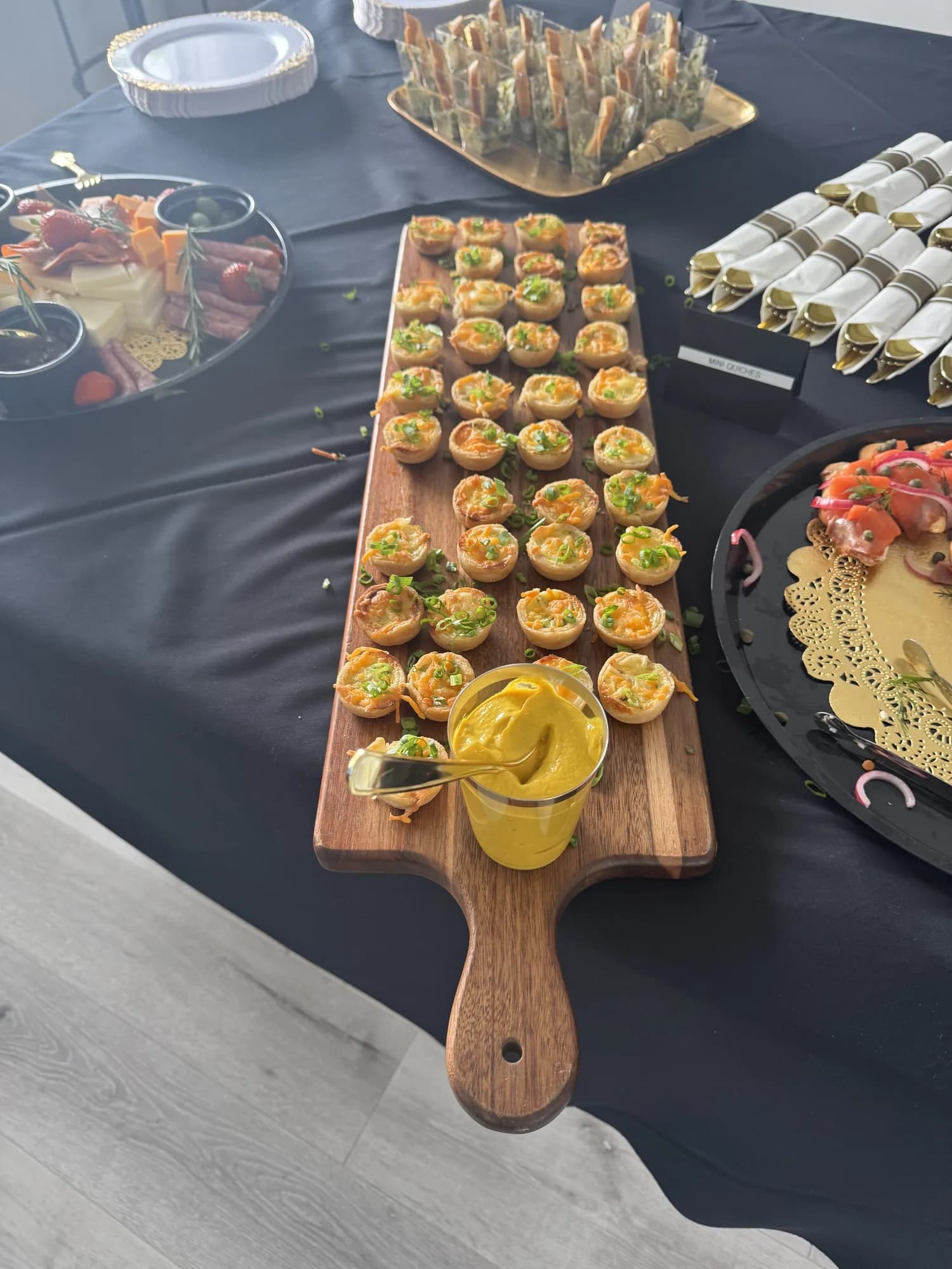 Canapés presented on a wooden board