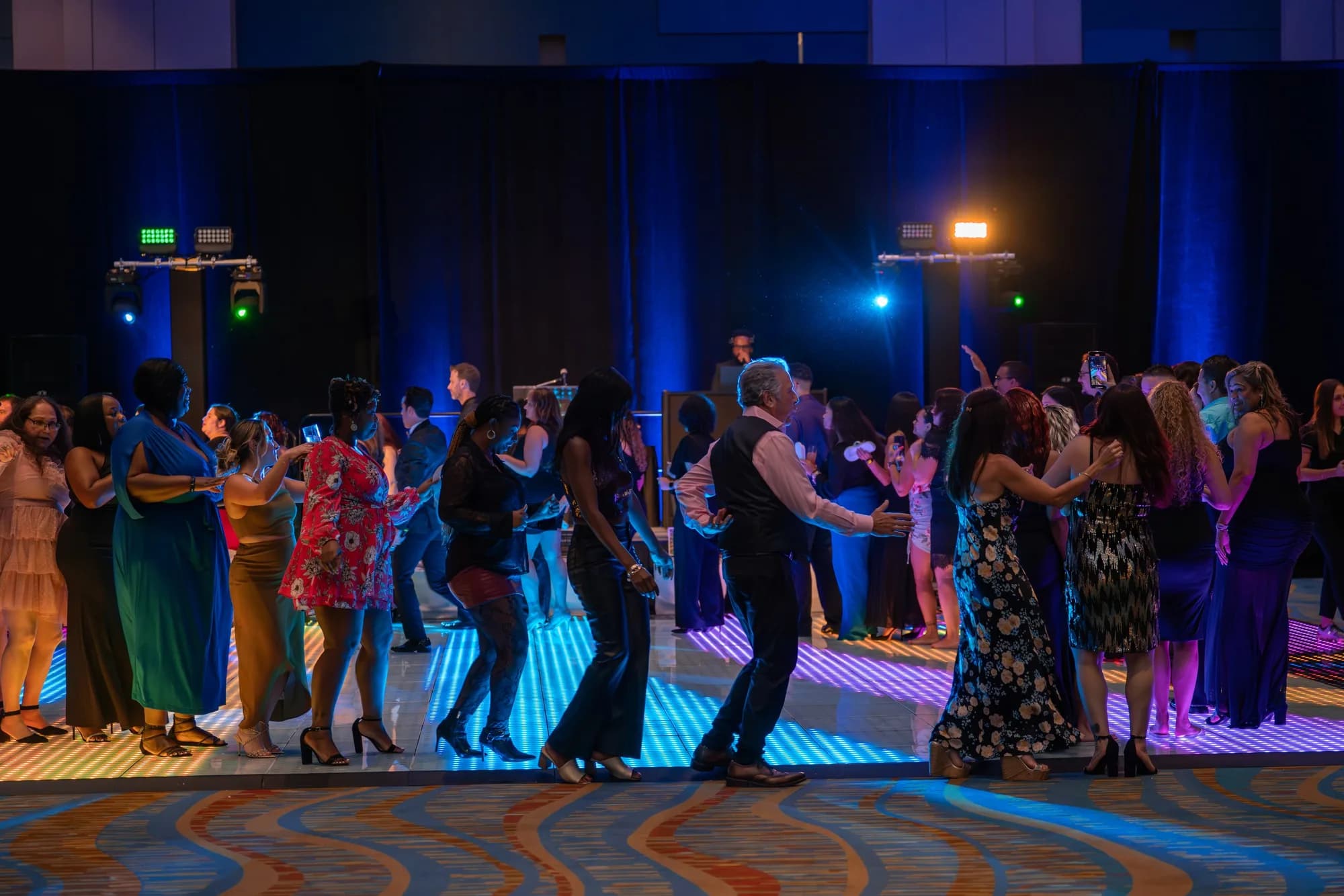 Guests on the dance floor at a gala
