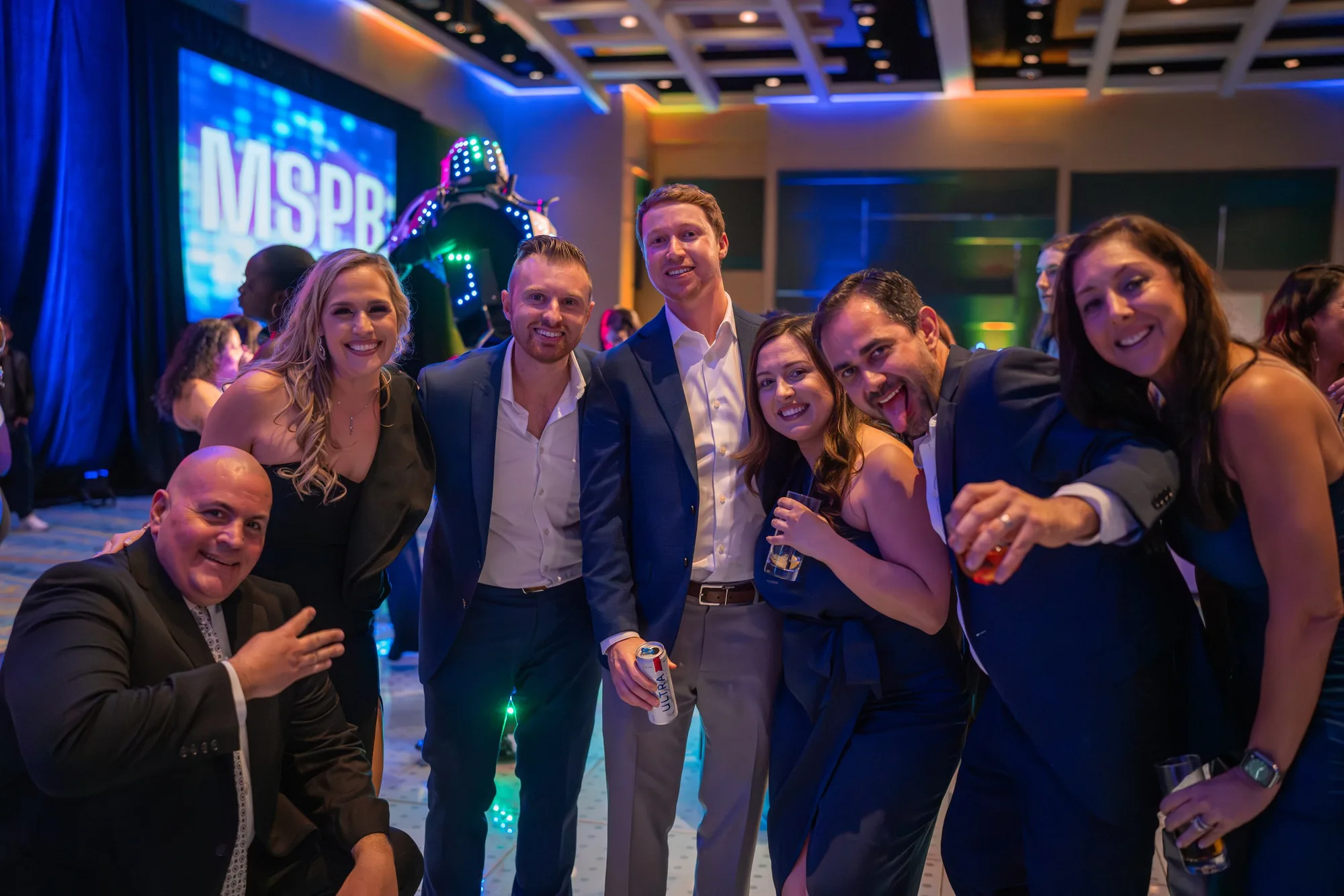 Guests posing at a gala
