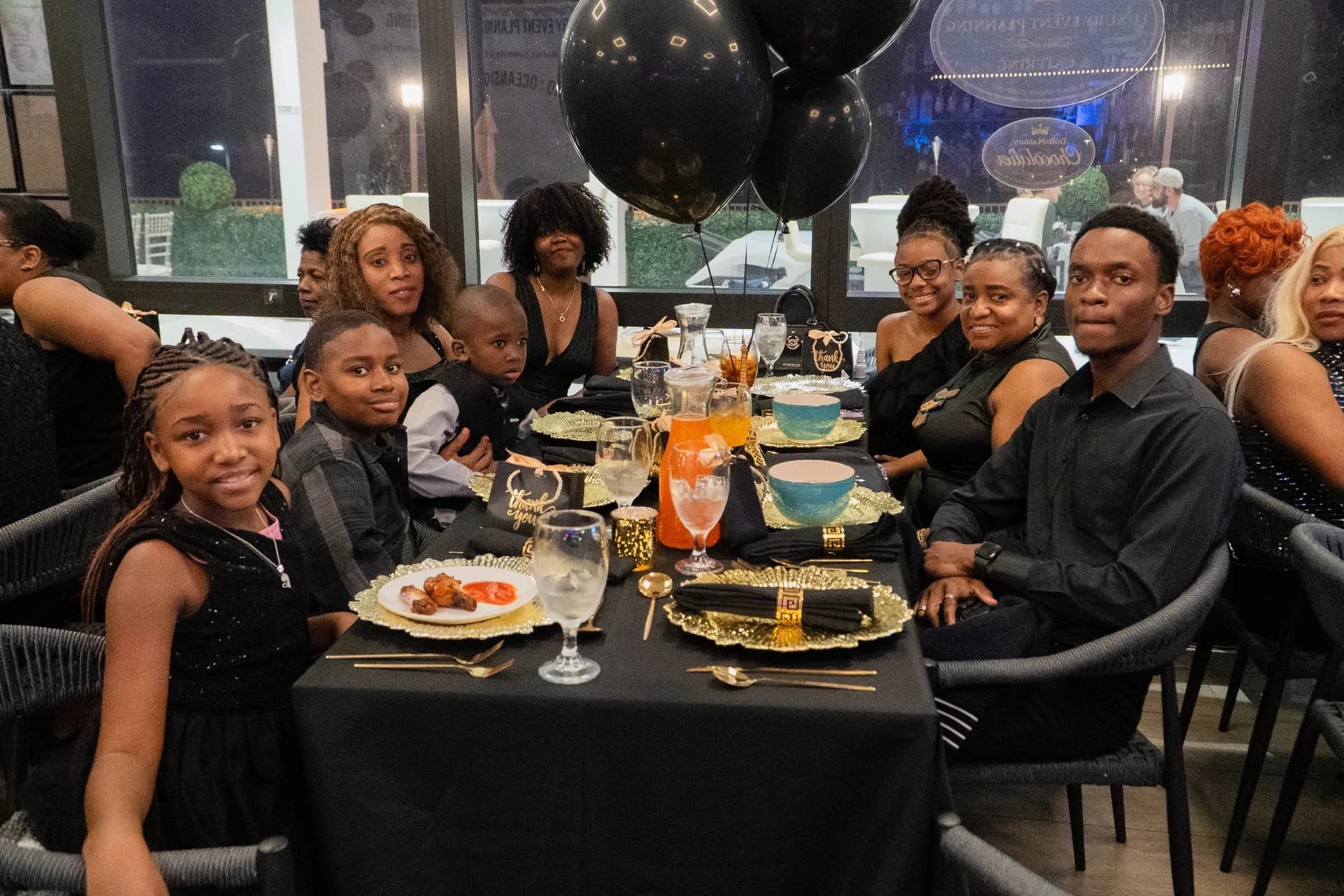 Family at a graduation celebration table