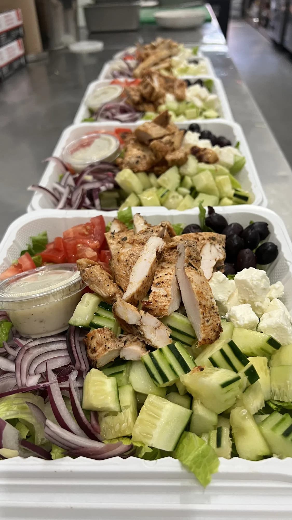 Greek salad meal prep with cucumber and feta
