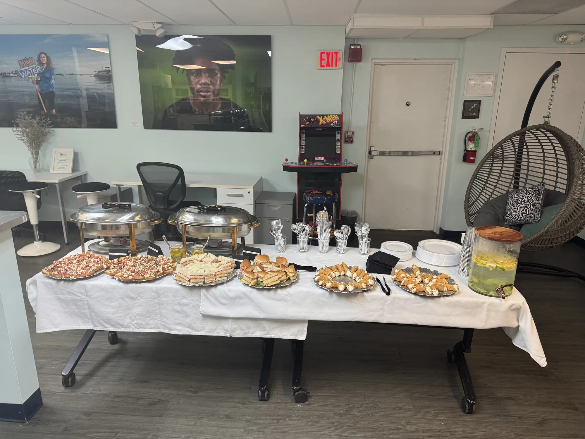 Office catering buffet on a white-draped table