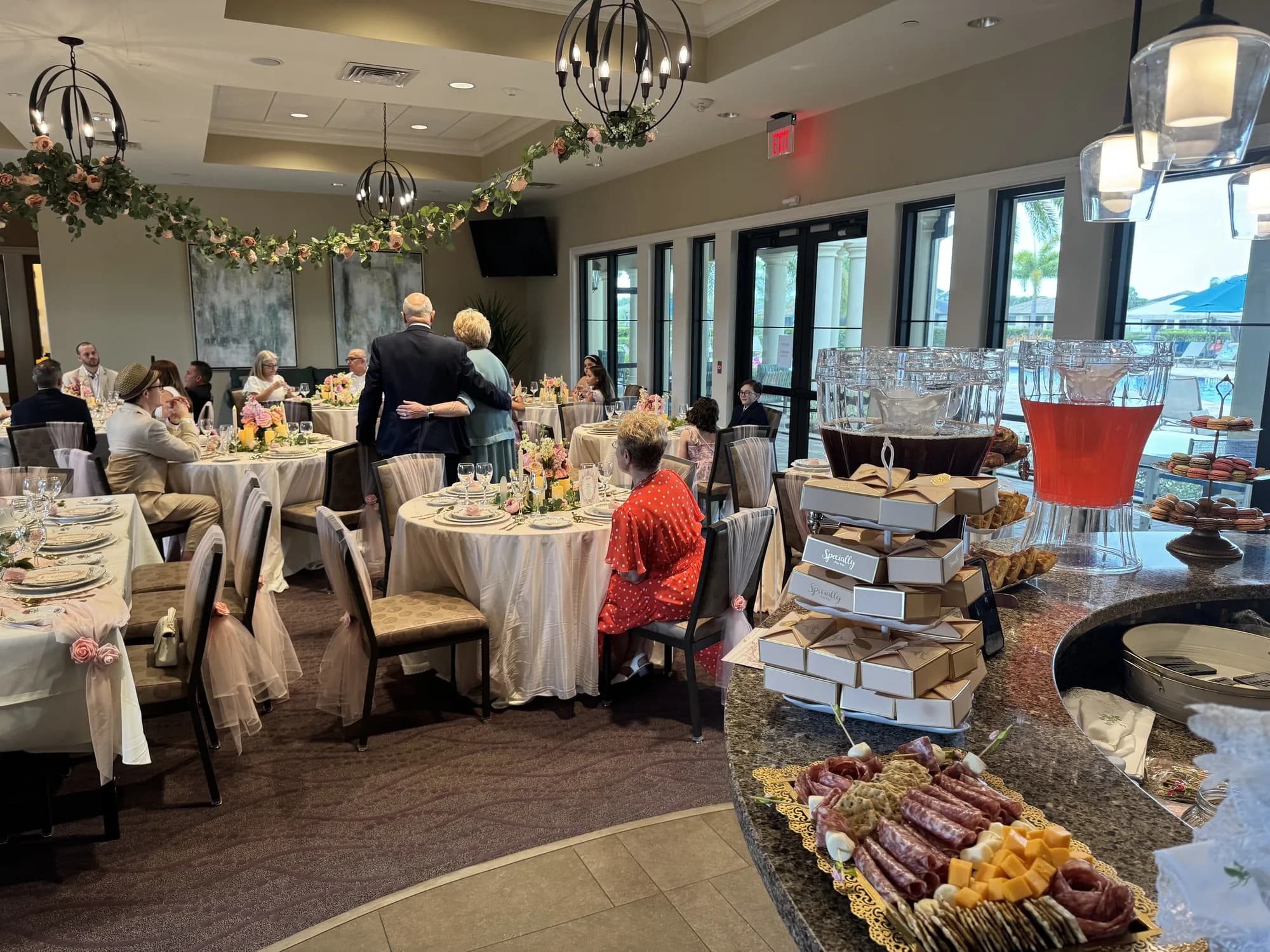 Quinceañera dessert display in a decorated hall