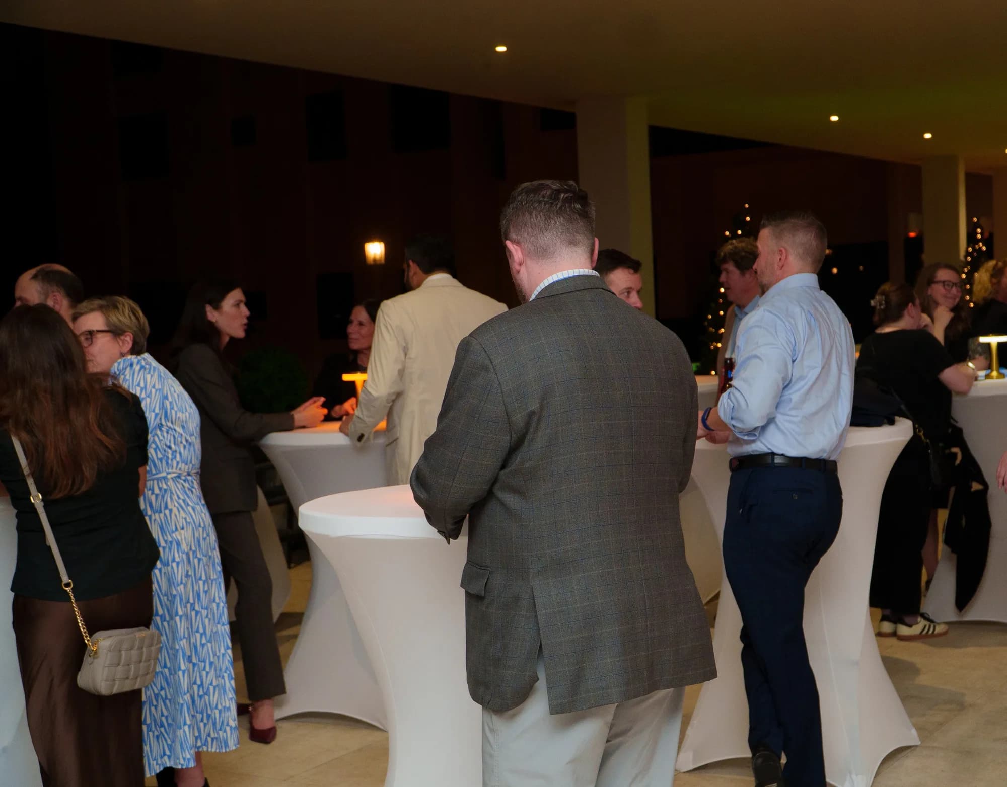 Attendees mingling at a catered corporate reception