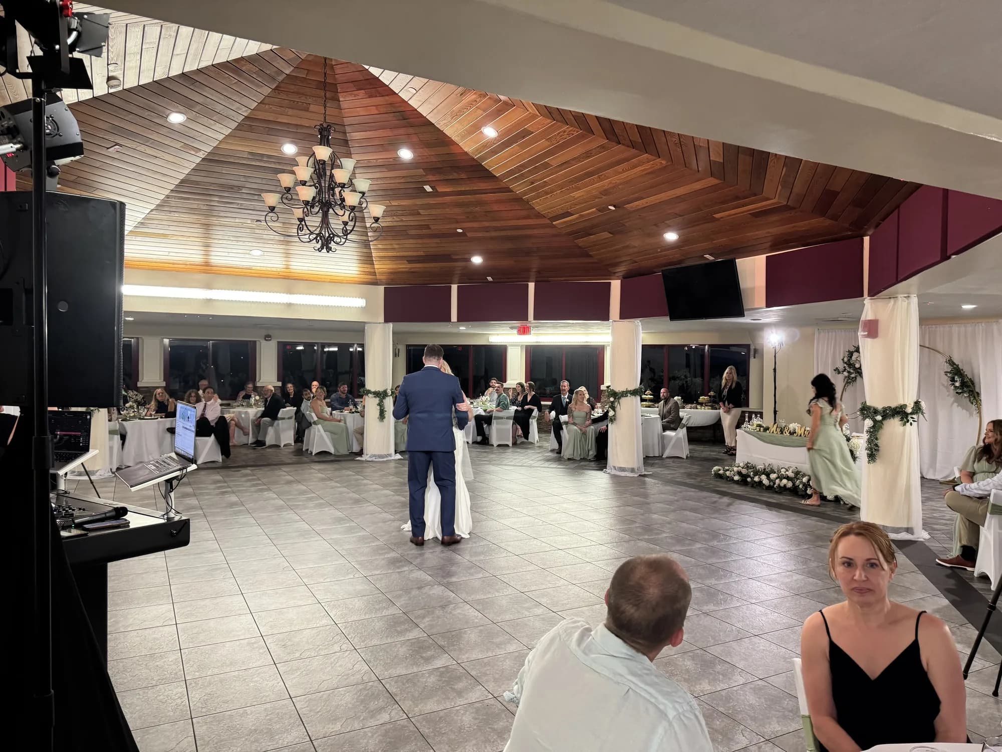 Wedding dance floor in a wood-ceiling ballroom