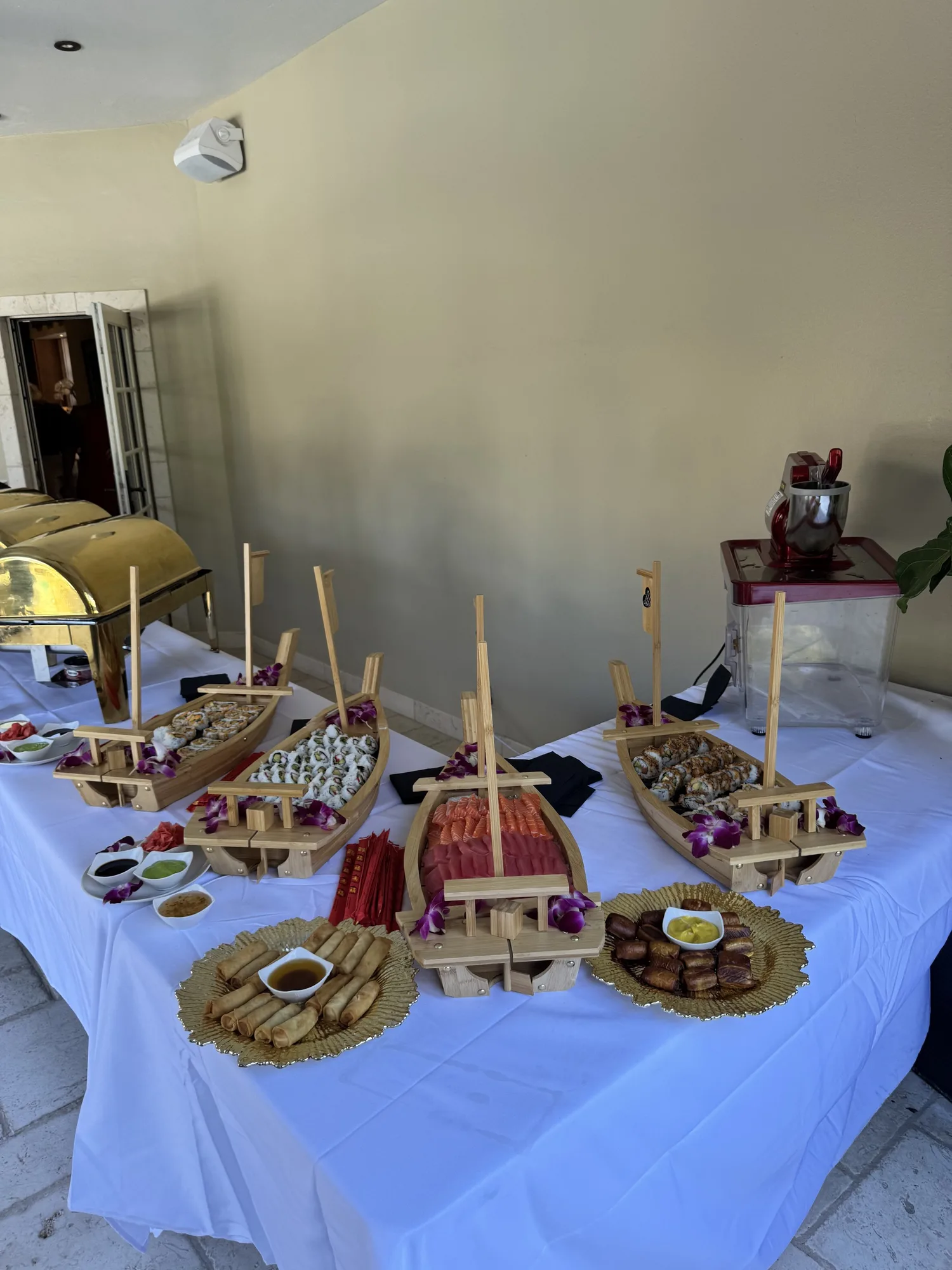 Tiered wooden riser display of appetizers